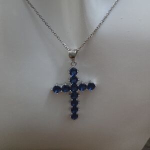 Rhodium Over Sterling Silver B Luce Sapphire Cross Pendant With 18inch Chain.